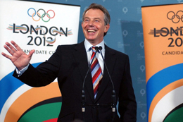 Tony Blair smiles broadly at the news that London was to host the 2012 Olympics