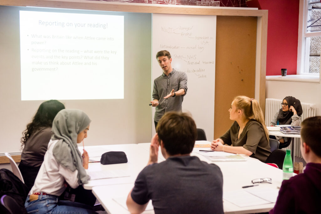 Jack Brown teaching pupils in a classroom