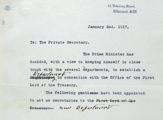 Extract of the draft note from 2 January 1917 on 10 Downing Street headed paper which reads 'To: The Private Secretary, the Prime Minister has decided, with a view to keeping himself in close touch with the several departments, to establish a ['Secretariat' is crossed out and replaced by 'Department'] in connection with Office of the First Lord of the Treasury. The following gentlemen have been appointed to act as secretaries to the ['First Lord of the Treasury' is crossed out and replaced by 'new Department']