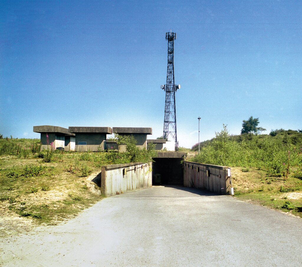 The entrance going into a large tunnel, with the tall Aspidistra on top. 