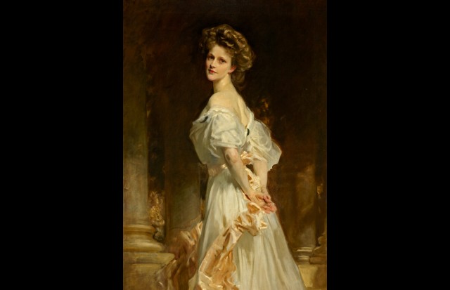 A young Nancy Astor posing with her back turned away from the painter.